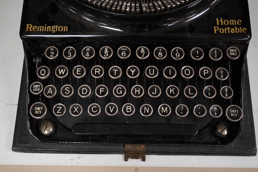 A cased Remington Home Portable typewriter. Condition - fair.